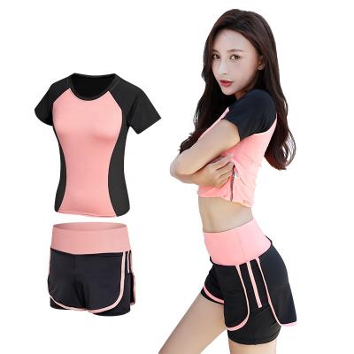 China 2021 2022 New Breathable Solid Color Shorts T-shirt Hip Up Yoga Pants Cotton Two Piece Sports Legging Fitness Set Women Wear for sale