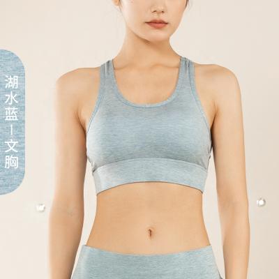 China Breathable Wholesale Women Gym Yoga Running Bra Tops Ladies Workout Fitness Sports Lift Up Sports Bra for sale