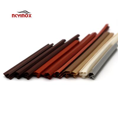 China Modern Wooden Waterproof Door Strip PVC Rubber Strip Door Anti-collision Plastic Strip for sale