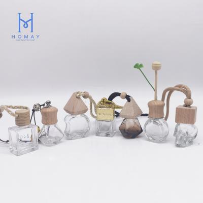 China Homay 6ml 10ml Mini Car Perfume Glass Cosmetic Refillable Bottles With Wooden Cap for sale