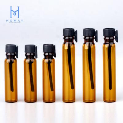 China Hiqh cosmetic grade clear1ml 2ml 3ml amber refillable cosmetic glass vials perfume with applicator for sale