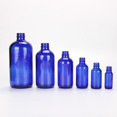 China Homay Cosmetic Packaging Blue Boston Glass Cosmetic Glass Bottles With Pumps And Caps 0.5oz 1oz 2oz 4oz 8oz 16oz for sale