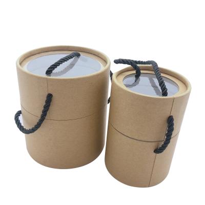 China Eco-Friendly Recyclable Wrapping Paper Tube Newspaper Dispensing Tea Canisters With Handle for sale