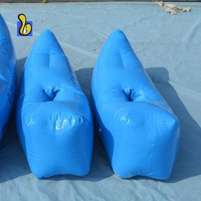 China Hot Selling 1.0mm PVC Water Game Blue Inflatable Water Shoes For Kids for sale