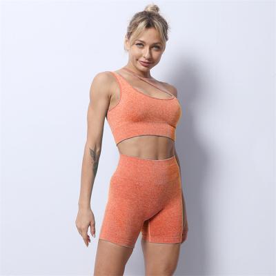 China Breathable Sexy Gym Sportswear Vest Strap Set Yoga Ladies Single Shoulder Belt Bra Shorts Sports Suit for sale