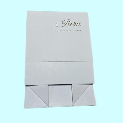 China Recyclable Custom Luxury White Magnetic Closure Large Size Folding Skin Care Clothes Packaging Paper Gift Box For Present for sale