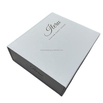 China Recyclable Custom Luxury White Foldable Magnetic Clothing Paper Box Closure Magnet Flap Gift Boxes With Black Ribbon for sale