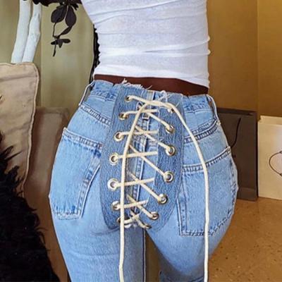 China Breathable High Waist Cavity Strap Women Ripped Jean Grommets Jeans Long Blue Jeans Pant Clubwear Outfits Women for sale