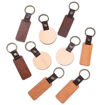 China 2022 New Custom Wooden Leather Round Hotel Key Chain Women Bar Key Chain Hotel Monogram White Engravable Disc for sale