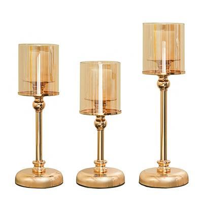 China Luxury home geometric tall candle holder wall decoration mold pillar metal candle holder for dining room table for sale