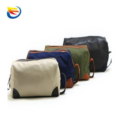 China Practical Waterproof Fashion Canvas And Leather Men Travel Makeup Bag Toiletry Cosmetic Bag for sale