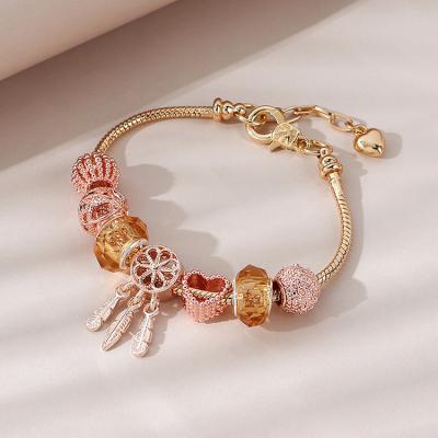 China FASHIONABLE High Quality Gold Plated Catcher Heart Charm Bracelet DIY Dream Hole The Big Bead The Dreamy Hook Charm Bracelet For Women for sale