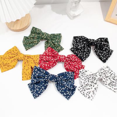 China Delicacy Custom Note Printing Large Solid Color Bow Hair Clip Ladies Cloth Ponytail Spring Hair Clip for sale