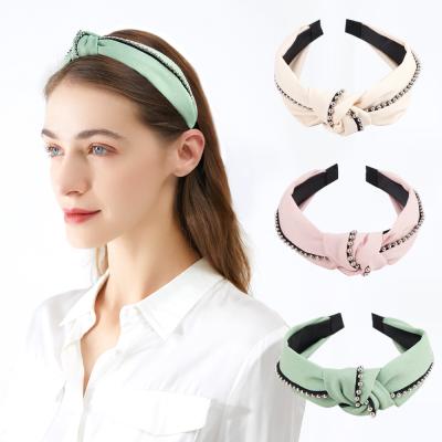 China Fashionable Women Hair Accessories Round Pearl Chain Knotted Headband Solid Color Canvas Fabric Wide Knot Headband for sale