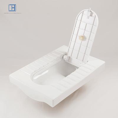 China Modern Modern simple ceramic squat toilet with cover for home use for sale