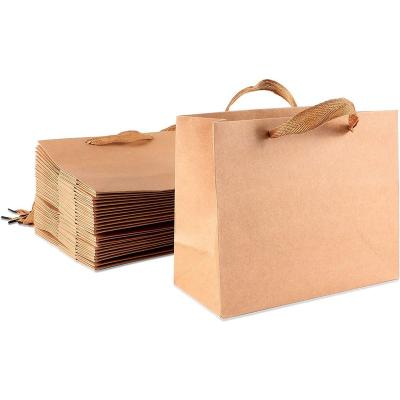 China Disposable Wholesale Cheap Price Eco Friendly Brown Kraft Paper Gift Bag for sale