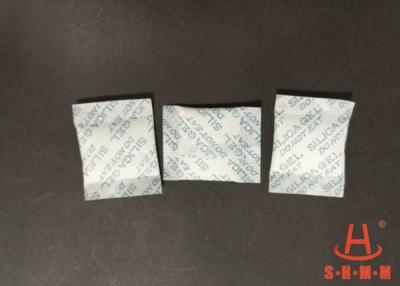 China Silica Gel 3g Desiccant Drying Packet Round Granular Appearance , 99% Purity for sale