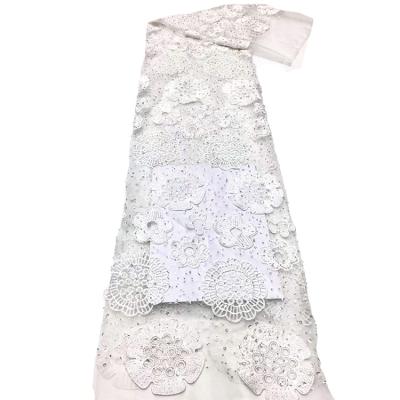 China 2021 Latest Viable Swiss Voile Lace In Switzerland Dye Border With Rhinestones Sequins Beaded Beads To Lace Fabric For Dress Fabric for sale