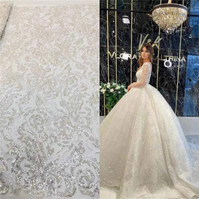 China 2021 New Top End Bridal White Beaded Lace Fabric Viable African Lace Fabric For Wedding Dresses for sale