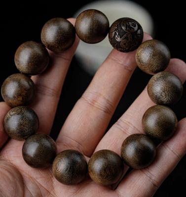 China Brazalete de madera de agar verdadero Nudo cocido Ajedrez Nan en forma de cubo Brazalete de cuentas de cuero Mujeres y hombres submarinos en venta