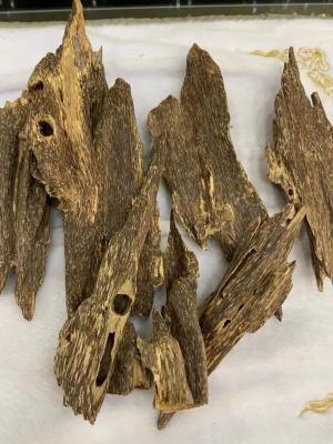 China 150g Hainan Agarwood silvestre Aloeswood natural Aceite negro raspado a granel Especias Insecto auténtico en venta