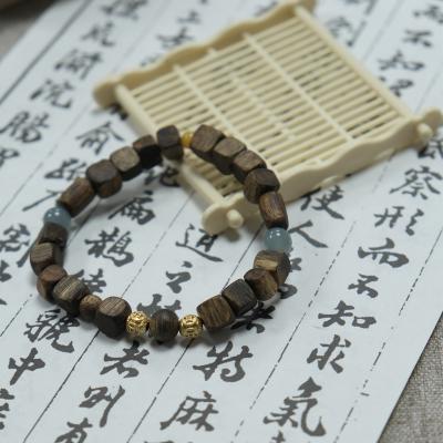 China Original Hand String Of Square Sugar Agarwood Red Agate for sale