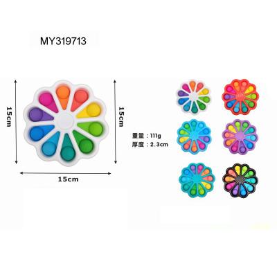 China Simple bubble fidgety person silicone finger rainbow color flower spinner sensory toys 15*15*1.5 for sale