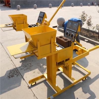 China QMR2-40 Stores Soil Manual Cement Building Material Interlocking Brick Making Machine Kenya for sale