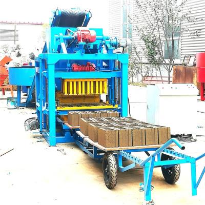 China Building Material Shops QTJ4-25C Automatic Cement Hollow Block Making Machinery Ivory Coast Price for sale