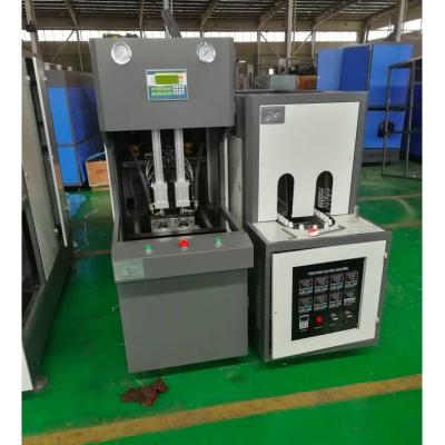 China Bottle Semi Automatic Blow Molding Machine Plastic PET 200ml-2L Bottle Making Machine Low Price Blower for sale