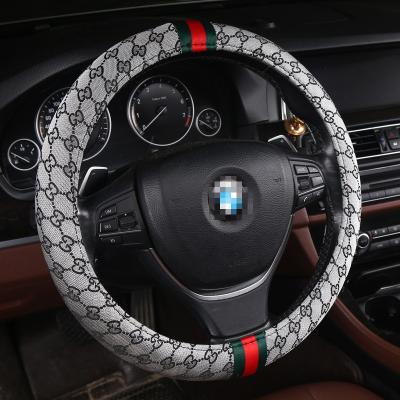 China Winter Use Car Steering Wheel Cover Four Season Personality Universal Fashion Car Non-slip Canvas Material Accessory for sale