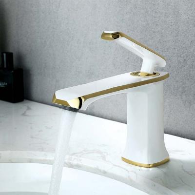 China Modern Brass Single Hole Bathroom Faucets Short Metered Basin Mixer Tap for sale