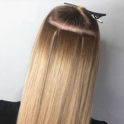 China Virgin Human Invisible Handtied Tape Pulled Silky Straight Double Wave Hair Extension Wigs 100% Remy Skin Weft Hair for sale