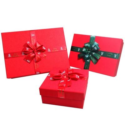 China Small Recyclable Christmas Gift Box Holiday Luxury Bow Cardboard Packing Box Is Available With Custom Logo for sale