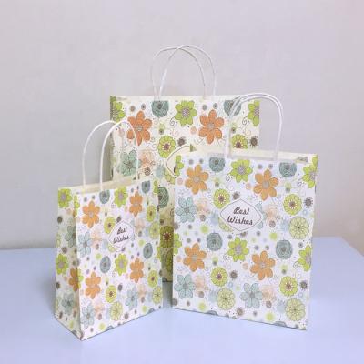 China Recyclable Custom Fancy Elegant Kraft Paper Bag Design Paper Gift Bag With Handle for sale