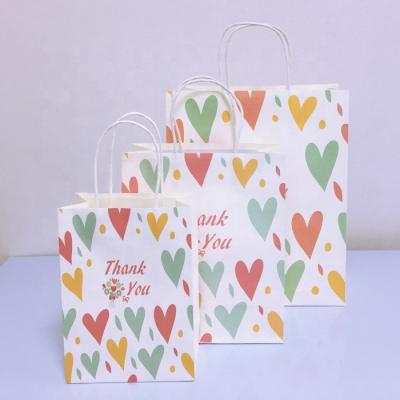 China Recycled Materials Snack Packing Bag Mini Eco Gift Bag Fancy Christmas Craft Custom Paper Bag for sale