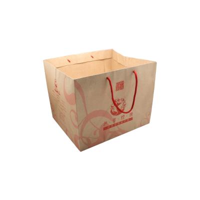 China Recyclable Packaging Logo Kraft Paper Bag For Big Red Cake for sale