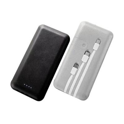 China Fast Charging Support UPL High Capacity 10000mah Powerbank 3 in Charging 1usb Cables with Phone Holder for sale