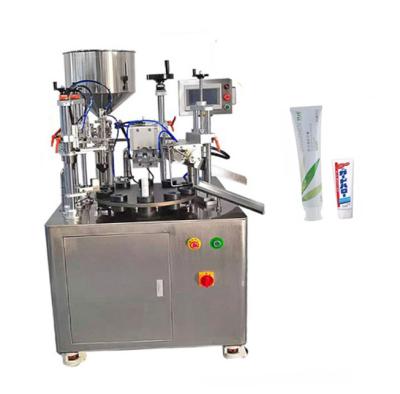 China Wholesale Soft Operated China Design Hand Cream Automatic Toothpaste Tail Tube Cosmetic Liquid / Paste Packing Filling And Sealing Machine for sale