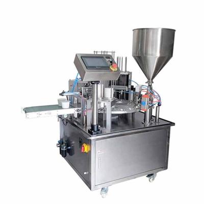 China High Quality JYD Food YT-300 Rotary Pneumatic Automatic Rotary Cup Sealing Machine for Ketchup and Yogurt Coffee Jam for sale