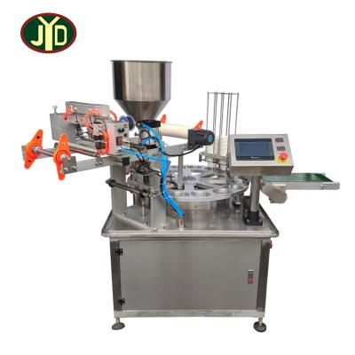 China Full Automatic Plastic Food Cup Filling And Sealing Machine With Roll Film For Mineral Water for sale