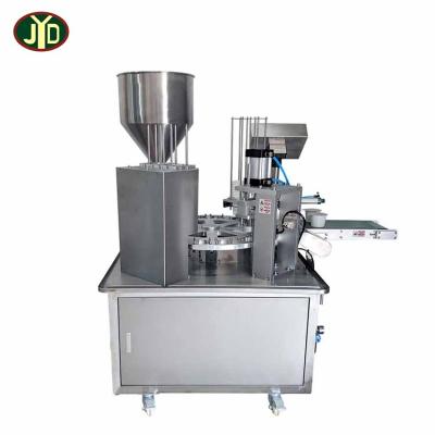 China Food Rotary Cups Ice Cream Filling And Plastic Film Sealing And Capping Machine Te koop