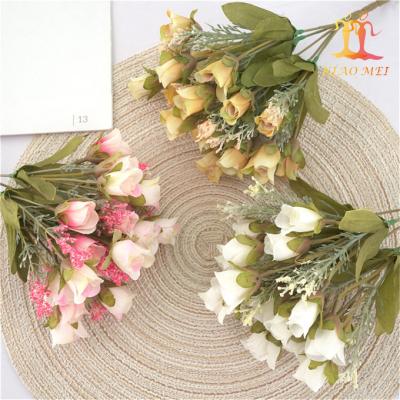 China Rose Factory Price Small Rose Buds Plastic Fancy Artificial Flower For Party Occasion for sale