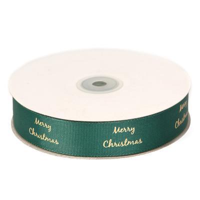 China Popular Size 2 Cm Width Eco - Friendly Foil Gold Logo Ribbon Customized Hot Stamping Printing For Christmas for sale