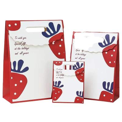 China Recyclable Strawberry Gift Bag Cartoon Unique Color Printing Bag Luxury Gift Shopping Paper Bag for sale