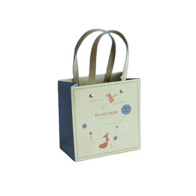 China Recyclable Easter Gift Bags Custom Paper Bags With Your Own Design Eco - Friendly Spring Paper Gift Bag for sale