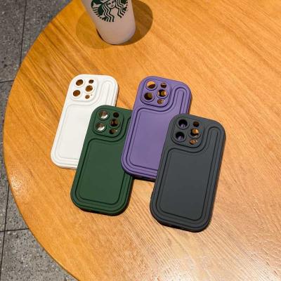 China Shockproof For iPhone14promax Phone Case Apple 13pro Silicone 12 Internet Celebrity 14 Creative Solid Color Air Cushion Female Simple Lines for sale