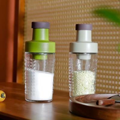 China Viable Small Glass Storage Salt Containers Food Packaging Spice Jar Containers With Spoon for sale