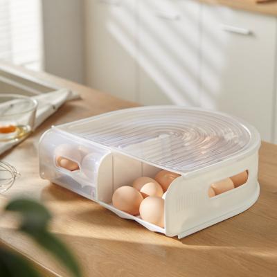 China Viable Kitchen Egg Row Automatic Scrolling Organizer Dispense Drawer Storage Rack Multilayer Stackable Storage Box for sale