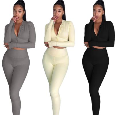 China Breathable Custom Logo Solid Two Piece Jogging Set Sport Women Cloths Zipper Crop Top And High Waist Pants Suit for sale